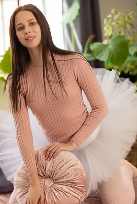 Alice Ross Slowly Teases In A Flirty Striptease Wearing Pantyhose And A Mini Skirt