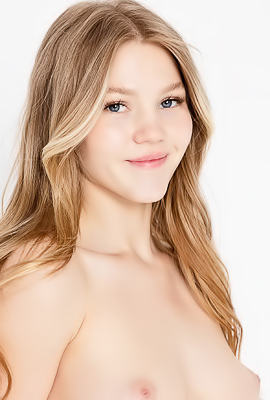 Intimate lace caresses Valeria Mints curves in an arresting studio shoot